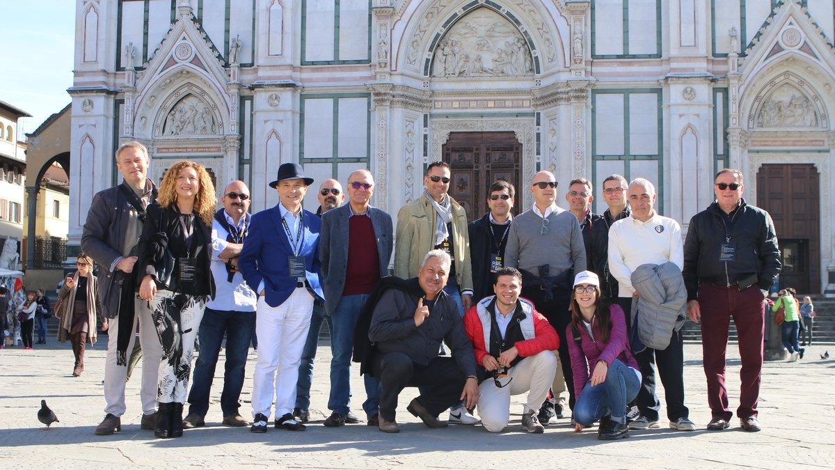 A company group in front of the Basilica of Santa Croce in Florence